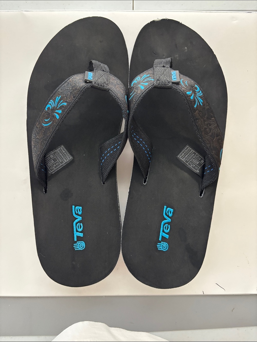 Teva Black Flip Flops with Turquoise Accents